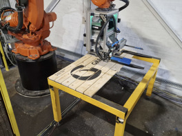 Robotic handling powers UV inkjet printing on to timber potato boxes