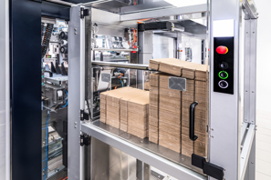 Shelf-ready tray and carton blanks can be loaded on to packing line in multiple ways
